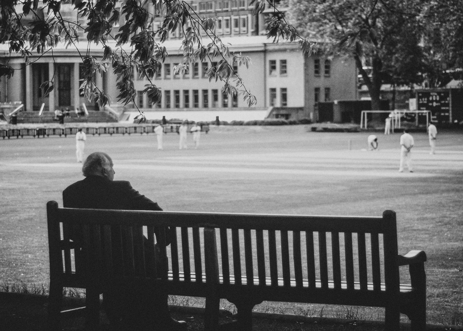 B&W, Dublin, Ireland, Trinity College, Trinity College Ireland* cricket, man on the bench